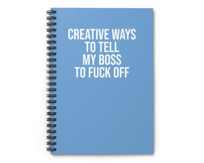 Blue notebook with white text on a white background