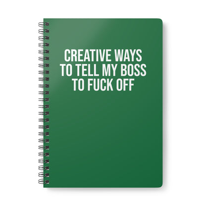 Green notebook with white text on a white background