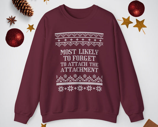 Maroon sweatshirt with Christmas-themed text and decorations on a white background