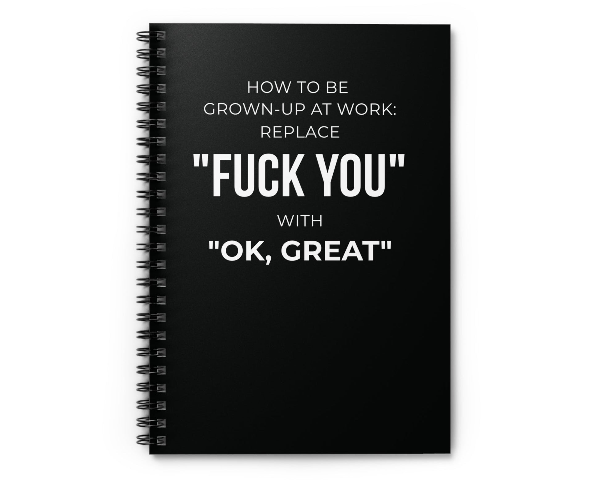 Black notebook with white text on a white background