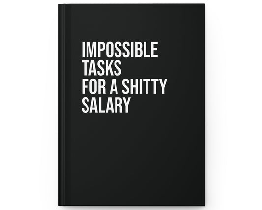Black notebook with white text on a white background