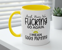 Mug with yellow interior and handle, featuring a humorous message on a white surface with a plant in the background.