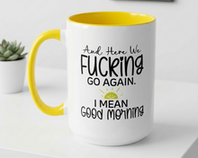 Mug with yellow interior and handle, featuring humorous text on a white surface.