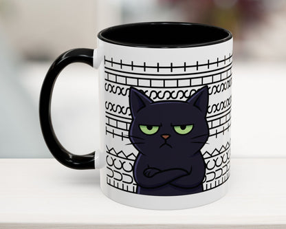 Mug with a black cat design on a white background