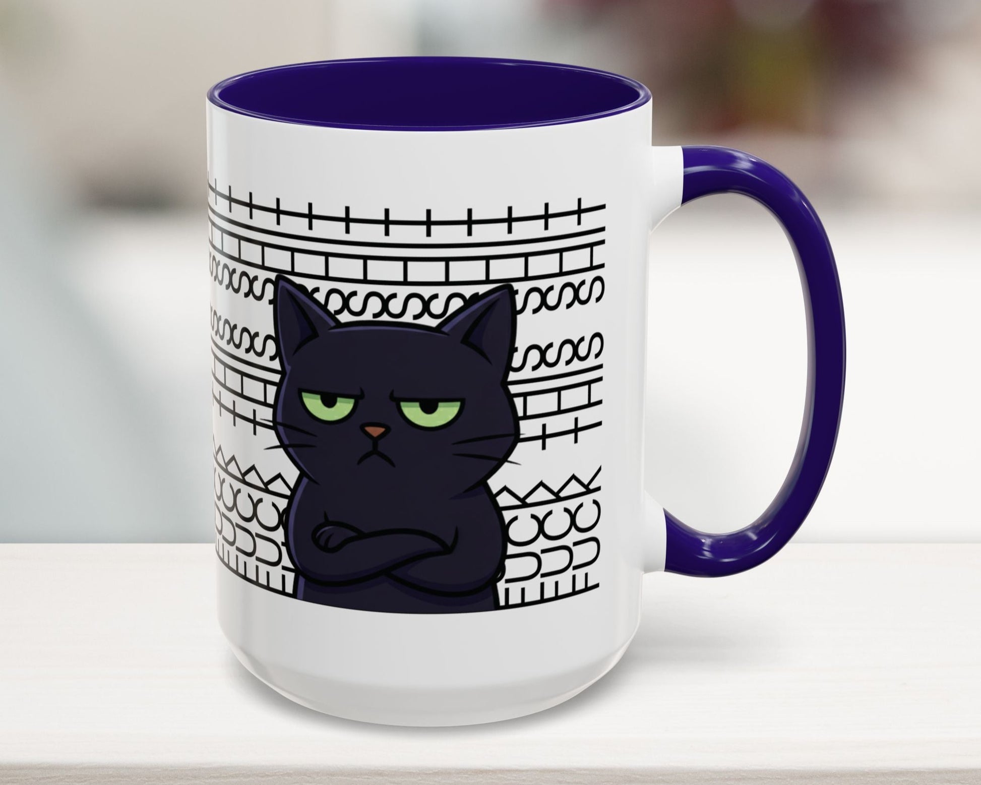 Mug with a black cat design and purple handle on a white surface