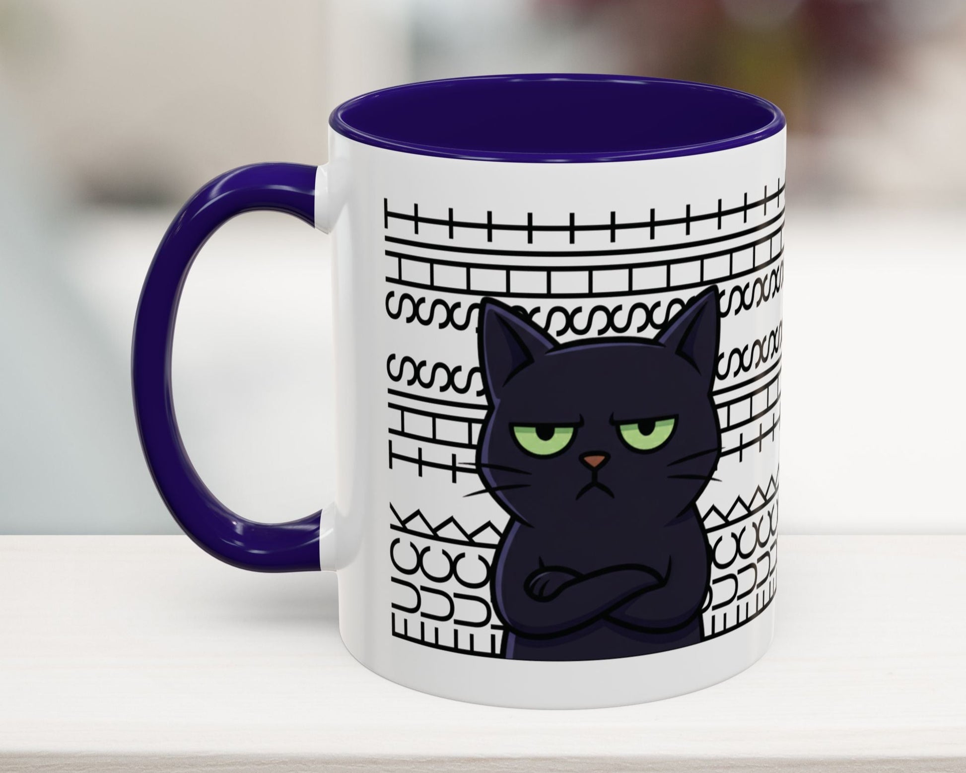 Mug with a black cat design and purple handle on a white surface
