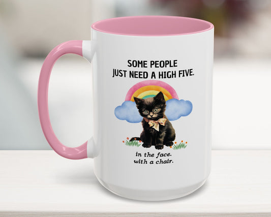 Mug with a black cat illustration and humorous text on a white surface.