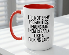 White mug with red interior and handle, featuring a humorous text design on a white surface.
