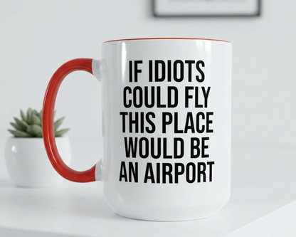 White mug with red handle and humorous text on a white surface.