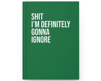 Green notebook with white text on a white background