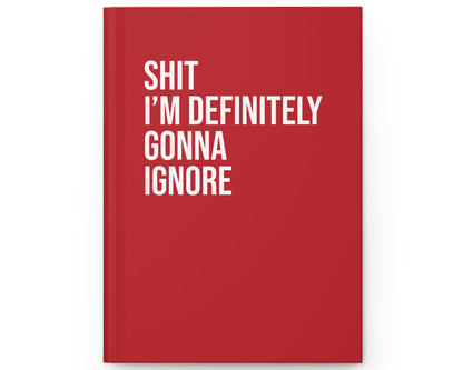 Red notebook with white text on a white background