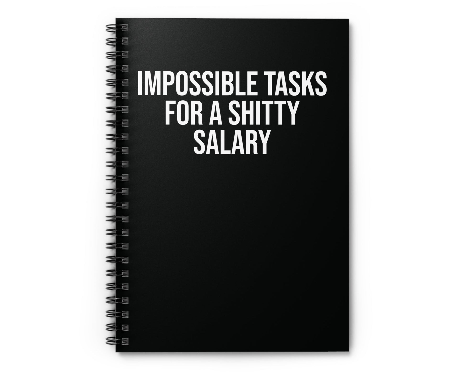 Black spiral-bound notebook with white text on a white background