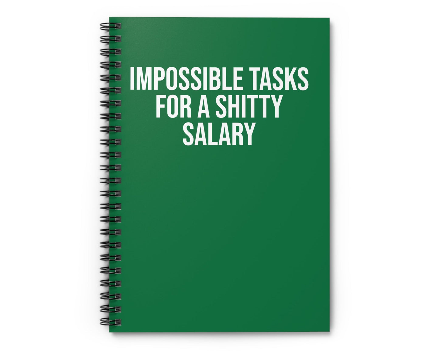 Green notebook with white text on a white background