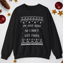 Black sweatshirt with text and patterns on a light gray background with decorative elements.