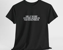 Black t-shirt with a white cross on a light gray background