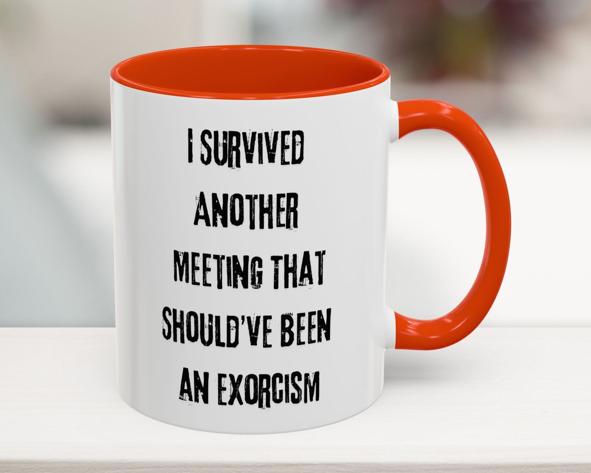 White mug with orange interior and handle, featuring a humorous text design.