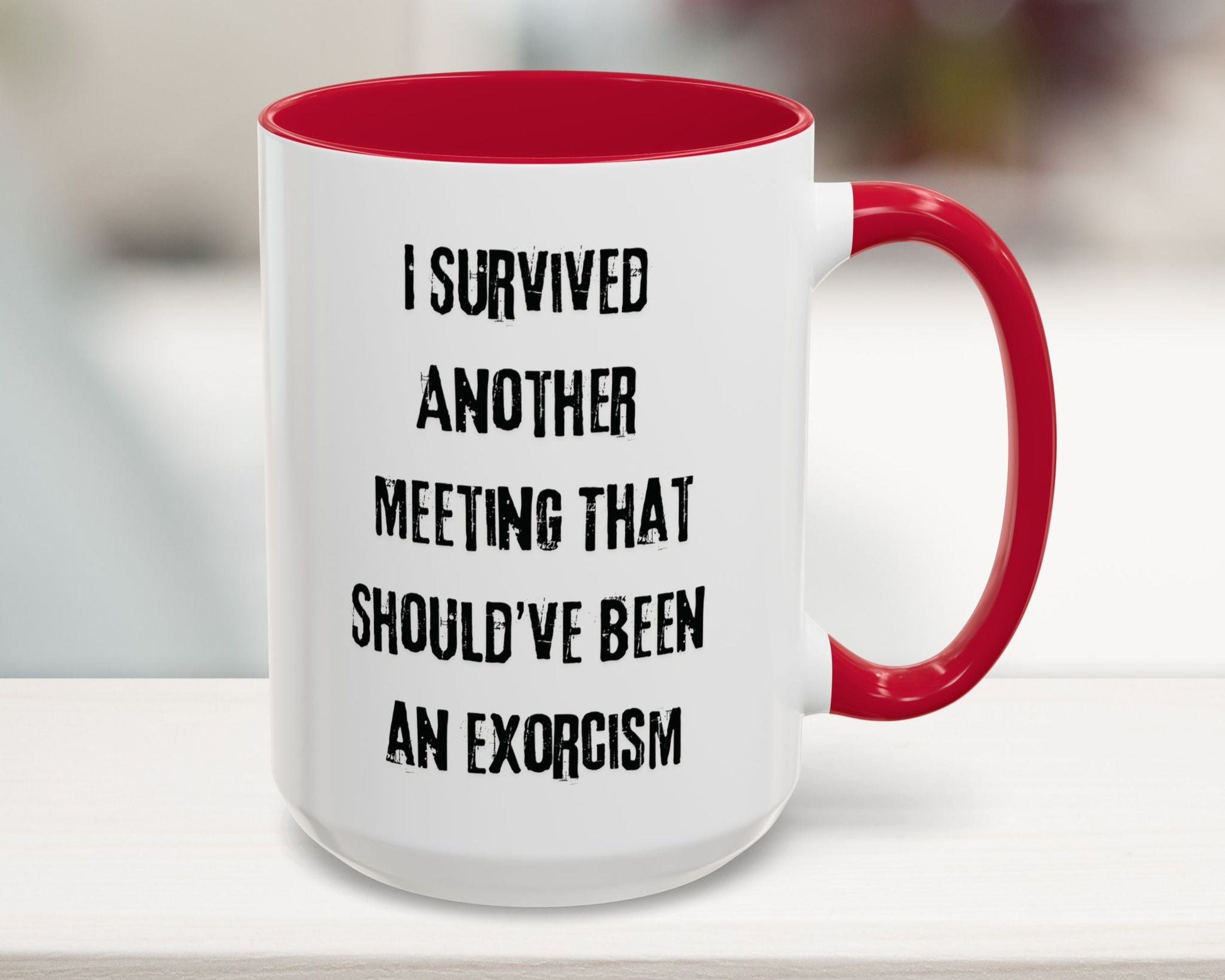 White mug with red interior and handle, featuring a humorous text design.