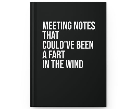 Black notebook with white text on a white background