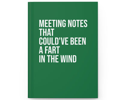 Green notebook with white text on a white background