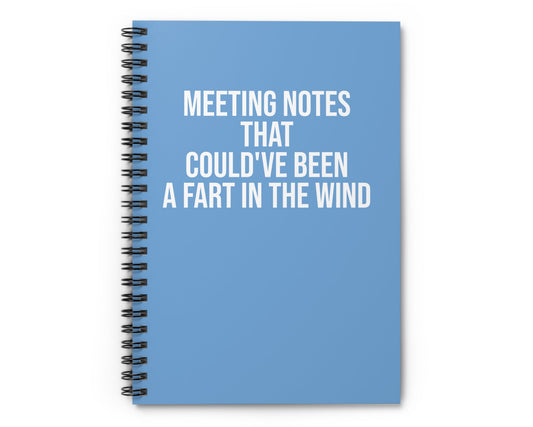 Blue notebook with white text on a white background