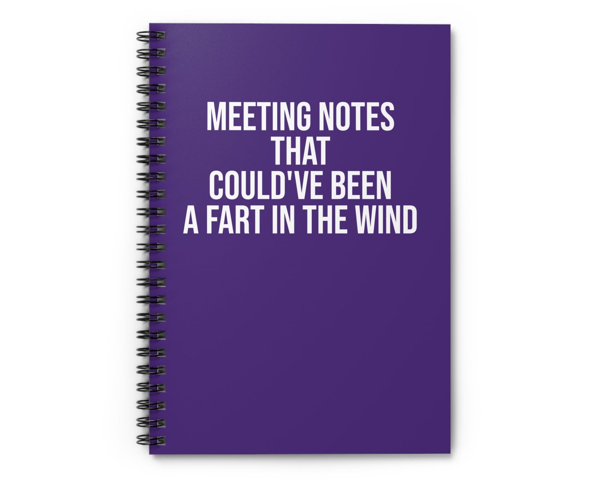 Purple notebook with humorous text on a white background