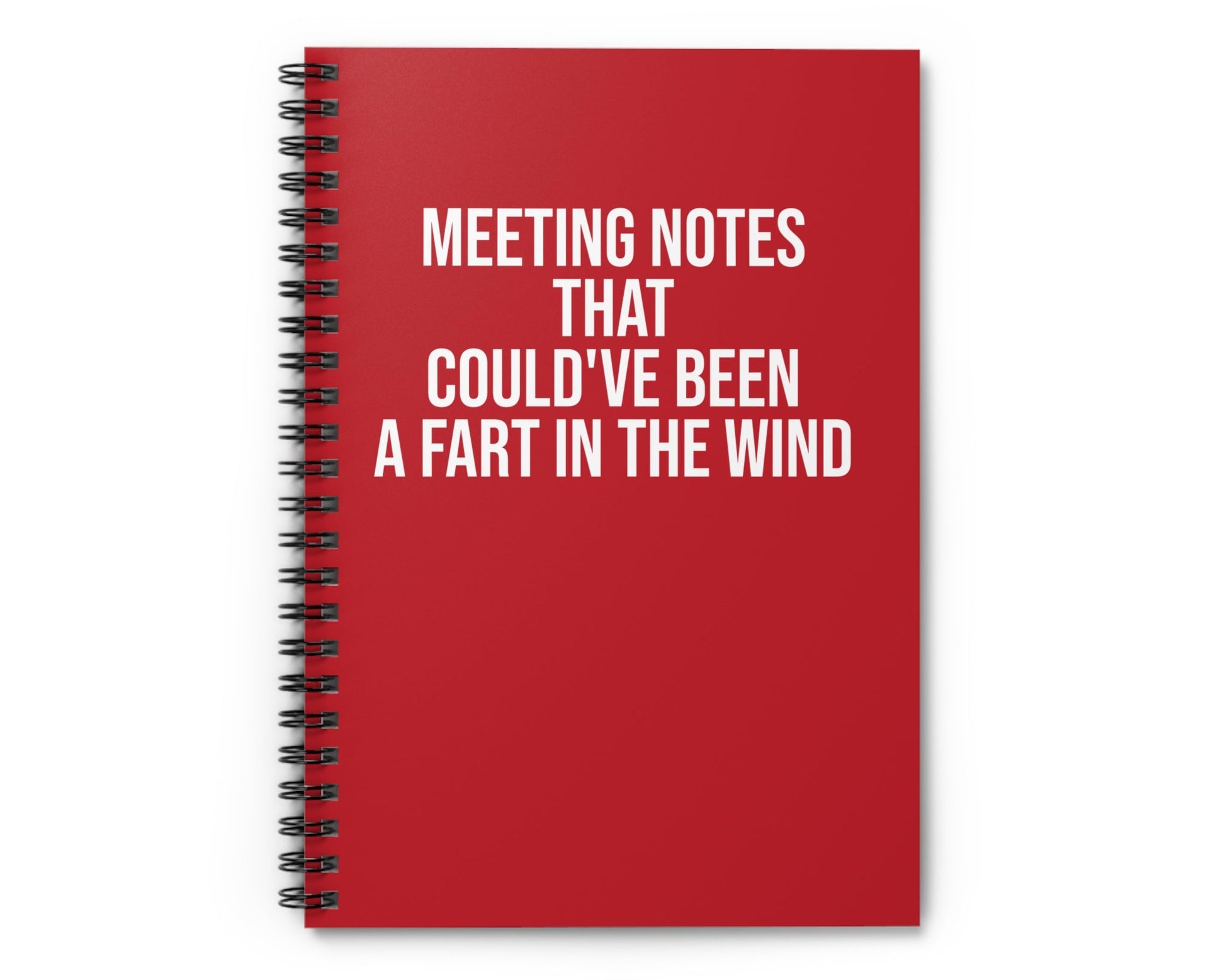 Red notebook with humorous text on a white background
