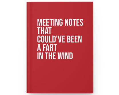 Red notebook with white text on a white background