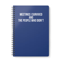 Blue notebook with white text on a white background