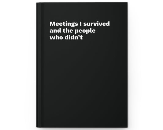Black notebook with white text on a white background