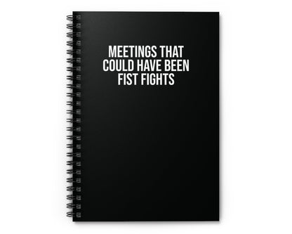 Black funny notebook with 'Meetings That Could Have Been Fist Fights' text