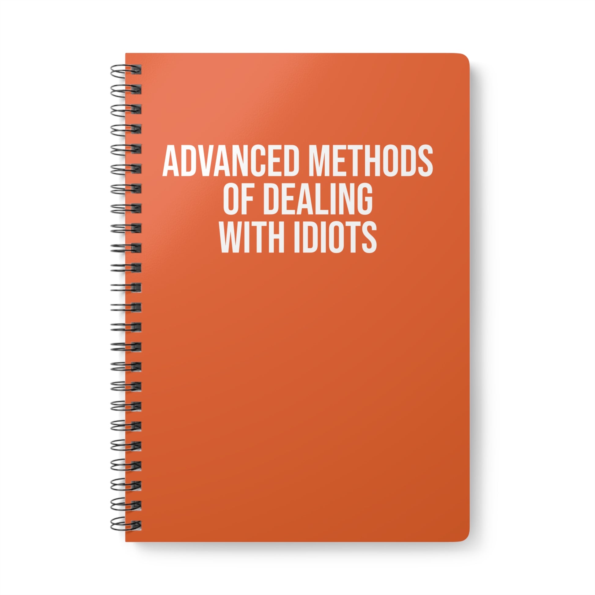 Orange notebook with white text on a white background