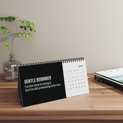Sarcastic desk calendar styled in a WFH setup with cozy vibes and office accessories.