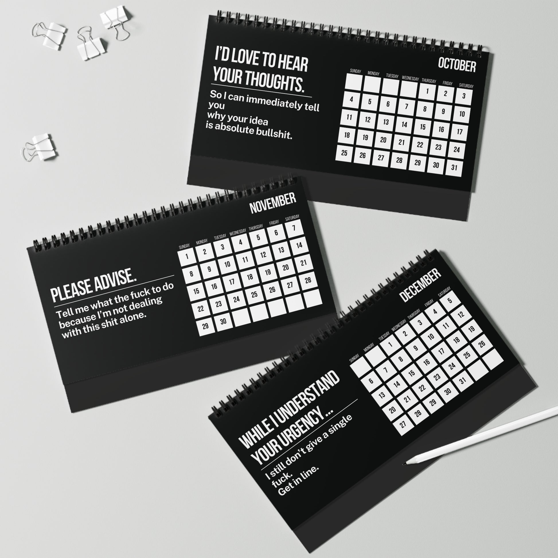Three black calendars with white text on a gray background