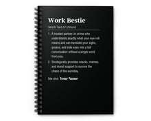 Black notebook with white text on a white background