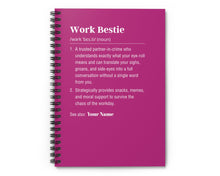 Pink notebook with text definition of 'Work Bestie' on a white background