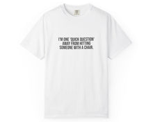 White t-shirt with black text on a white background