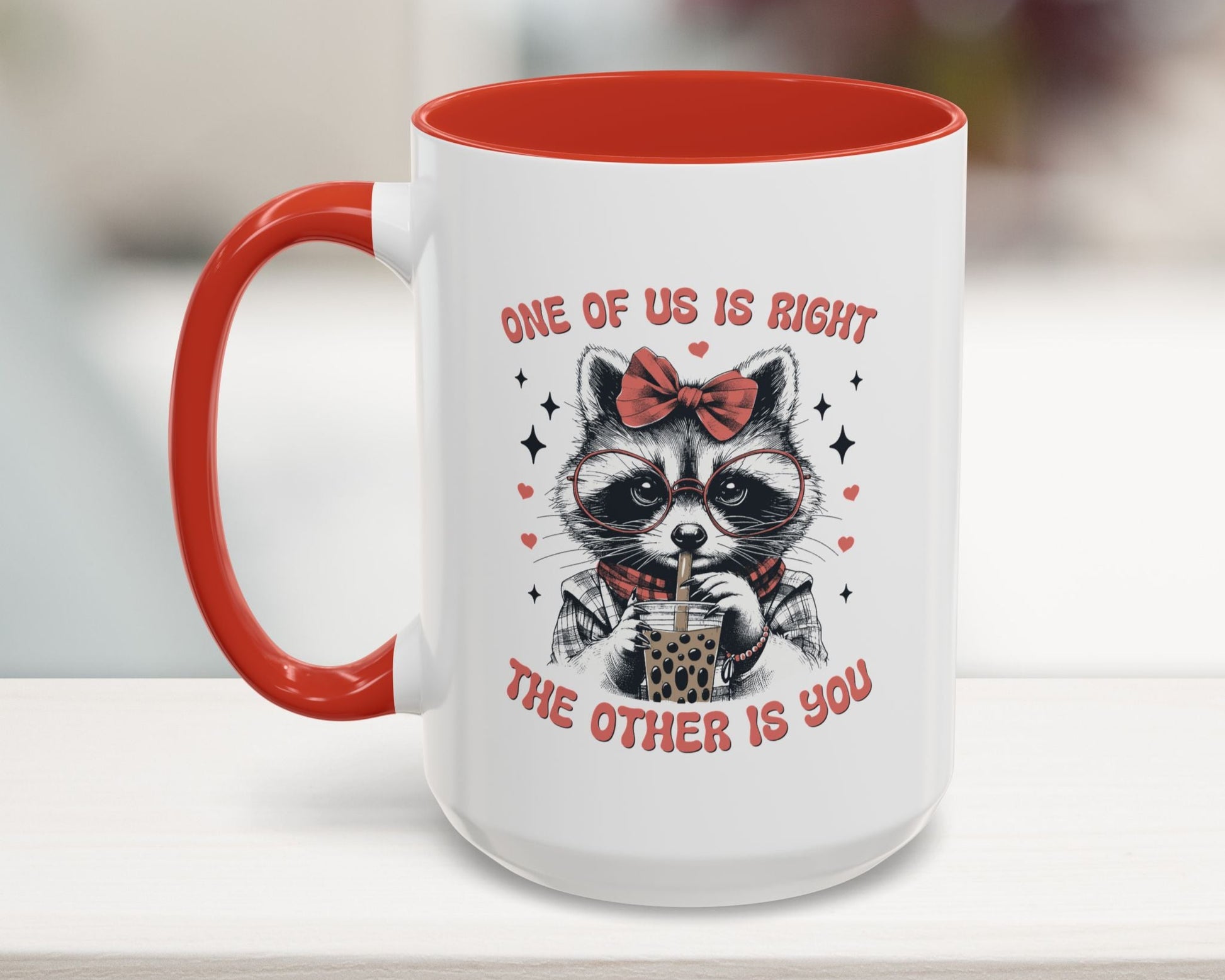 red 15oz mug with funny raccoon and quote “One of Us is Right, The Other is You”