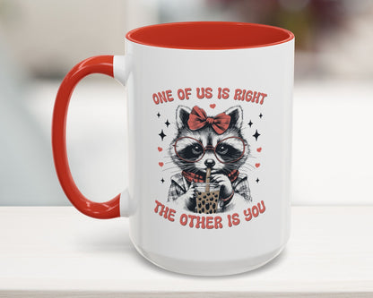 red 15oz mug with funny raccoon and quote “One of Us is Right, The Other is You”