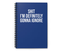 Blue notebook with white text on a white background