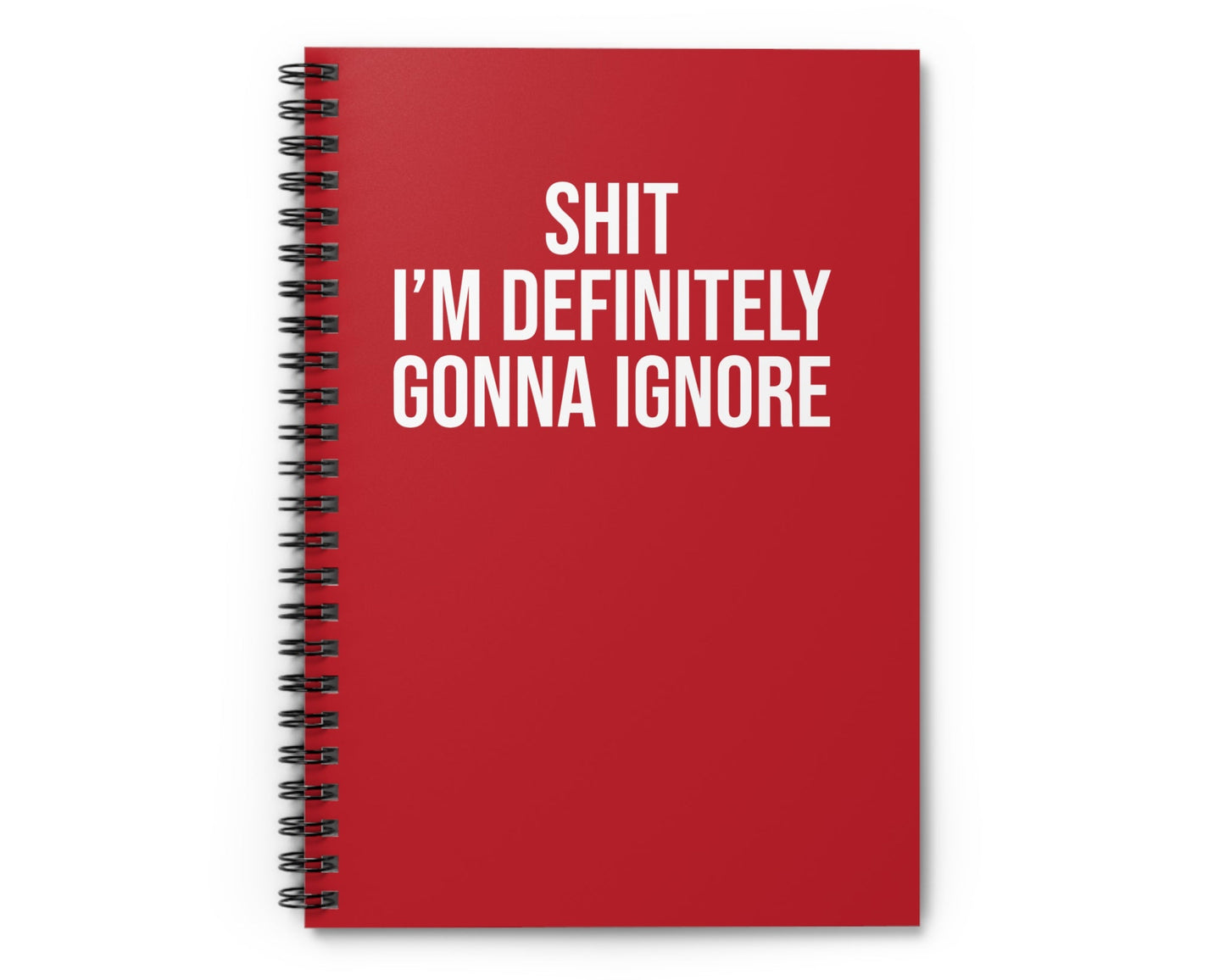 Red notebook with white text on a white background