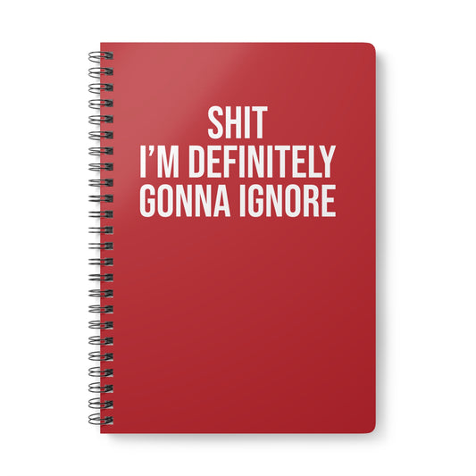 Red notebook with white text on a white background