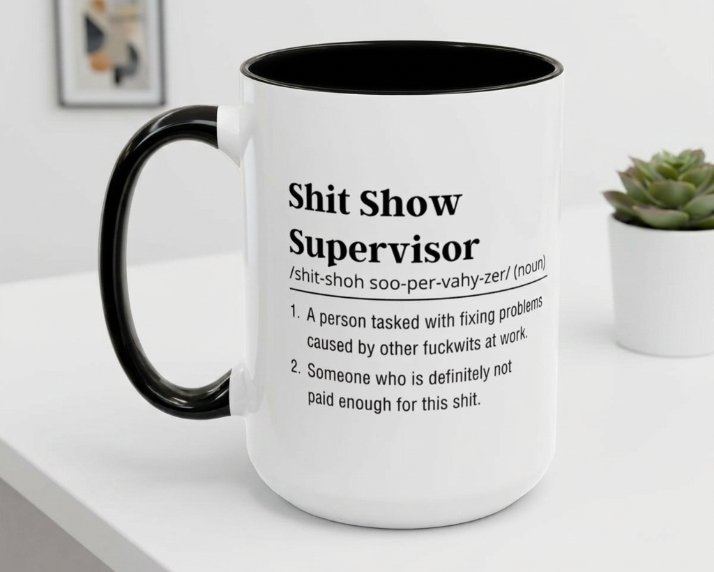 Mug with humorous definition text on a white surface