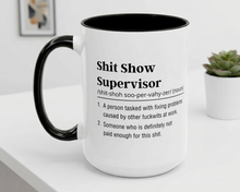 Mug with humorous definition text on a white surface