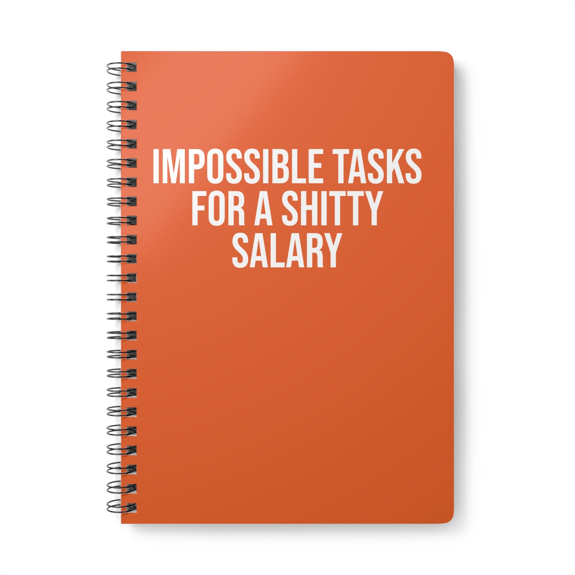 Orange notebook with white text on a white background