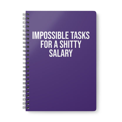Purple notebook with white text on a white background