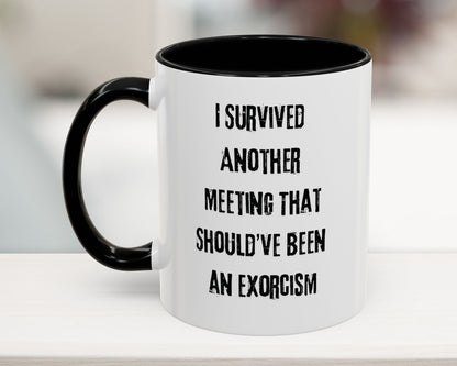 White mug with black interior and handle, featuring text on a blurred background