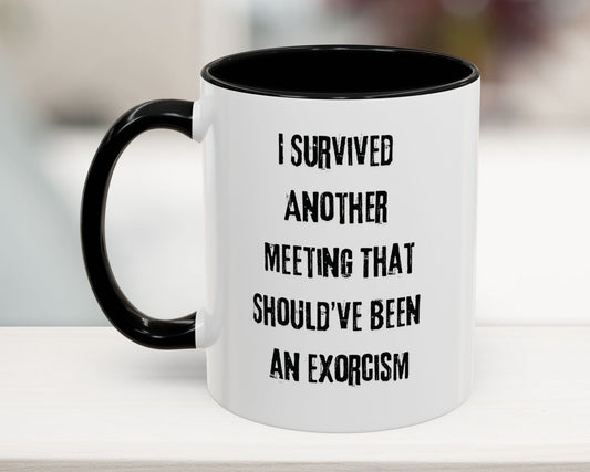 White mug with black interior and handle, featuring text on a blurred background