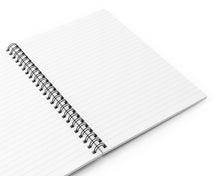 Open spiral-bound notebook on a white background