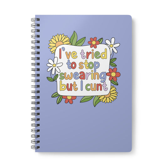 Notebook with colorful floral design and text on a white background