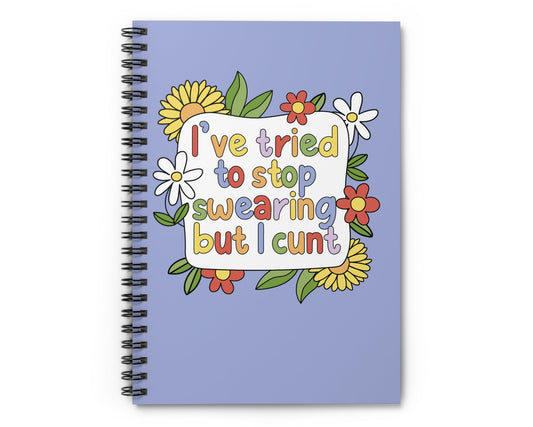 Notebook with colorful floral design and text on a white background